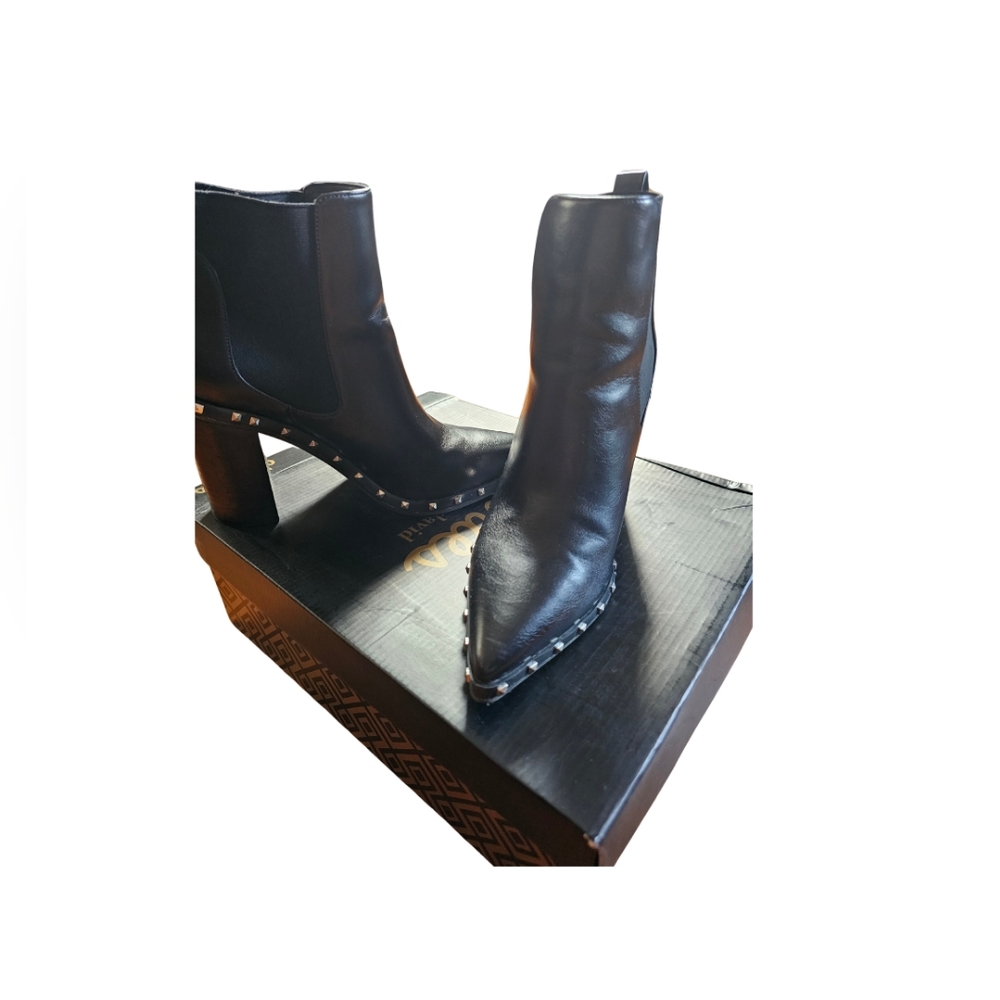 Charles by Charles David black ankle boots with stubs around the base
